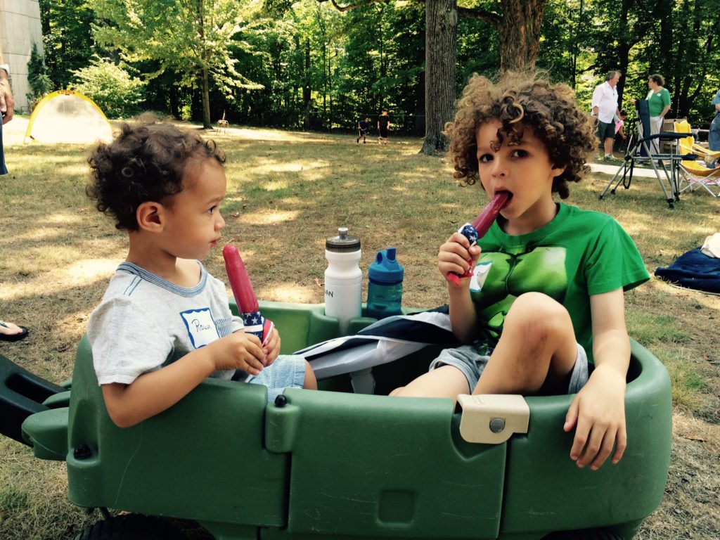 Popsicles in a boat. What better way to survive a hot summer day? Rowan Camara, 2, and Milo Camara, 5, of Woburn, enjoyed the Staycation Picnic at the Wellington Station park.