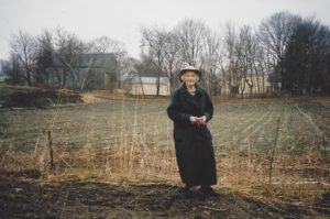 Lydia Ogilby on her family’s Belmont farmland. Photo courtesy of Richard Cheek.