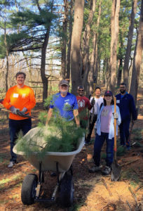 Roger Wrubel and volunteers at Lone Tree hill