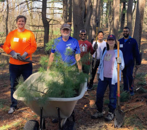 Roger Wrubel and volunteers at Lone Tree hill