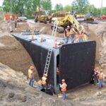 "Cut and cover" tunnel construction.