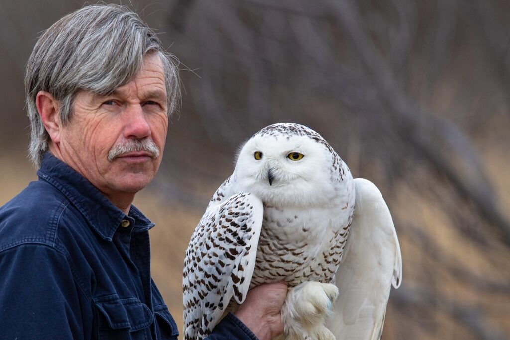Man with Snowy Owl